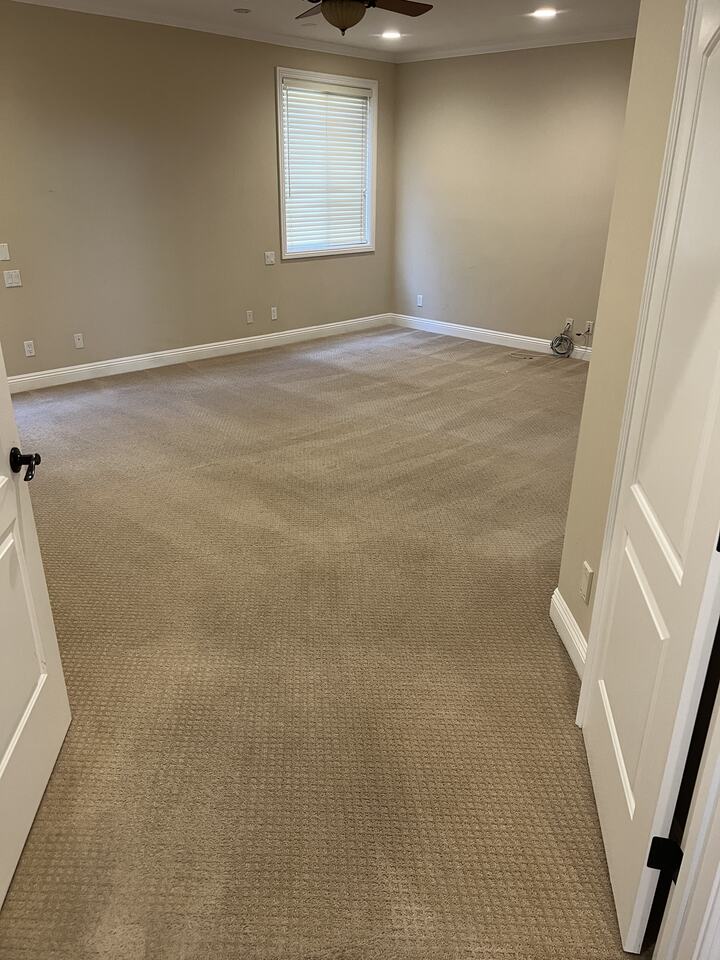 Bedroom carpet viewed through the doorway